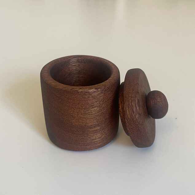a small pot in mahogany